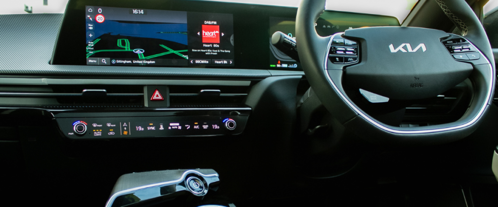 The infotainment system and steering wheel of a Kia EV6