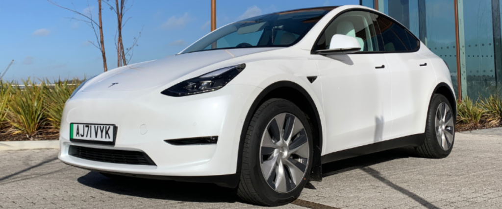 Front of white Tesla Model Y at an angle
