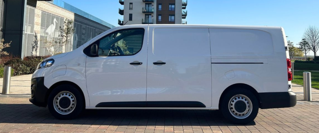 White Vauxhall Vivaro-e side on shot