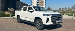 White Maxus T90 at an angle facing right