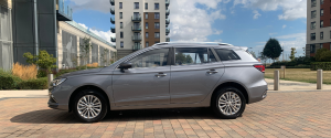 Silver MG5 facing left.