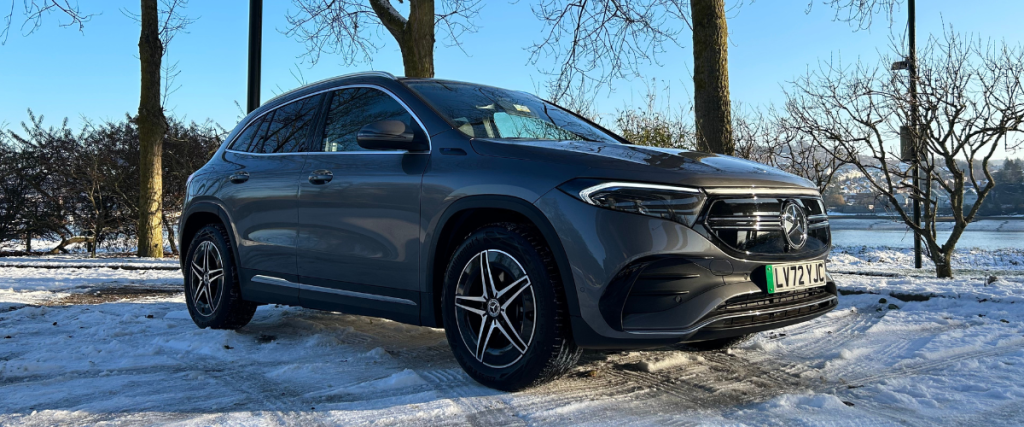 Blue Mercedes EQA in the snow